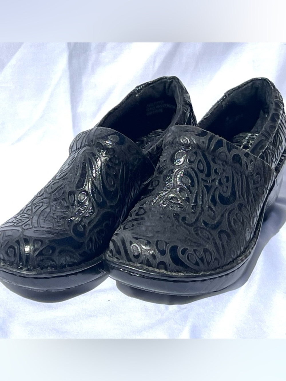 b.o.c. Black Slip-On Loafers with Embossed Swirl Pattern